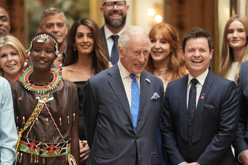 King Charles standing with Declan Donnelly in a group shot