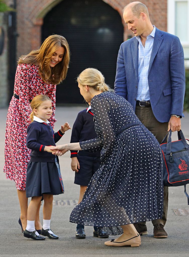 Princess Charlotte shakes headteacher's hand on first day at school