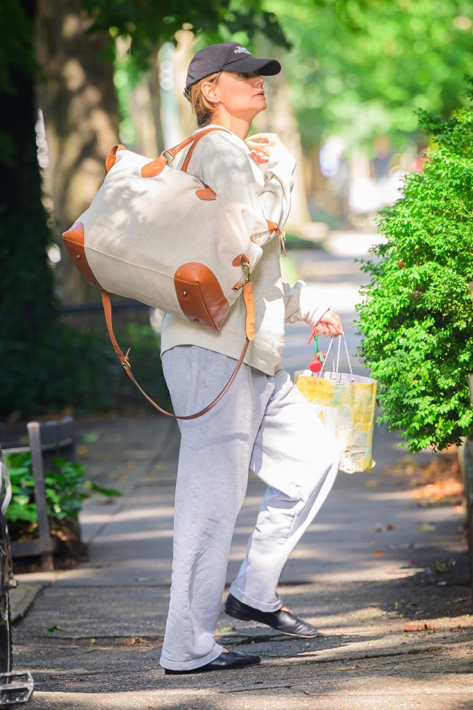 Katie Holmes seen arriving home after dropping off her daughter Suri at college in Pittsburgh.

