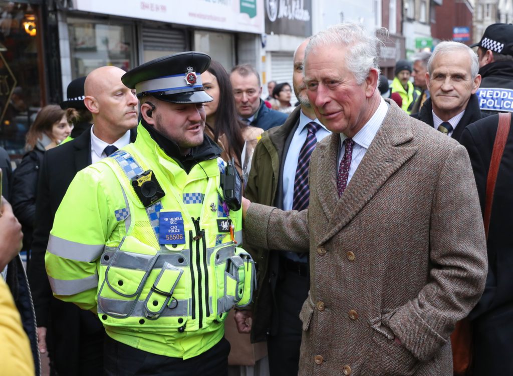 King Charles with a police officer in Pontypridd