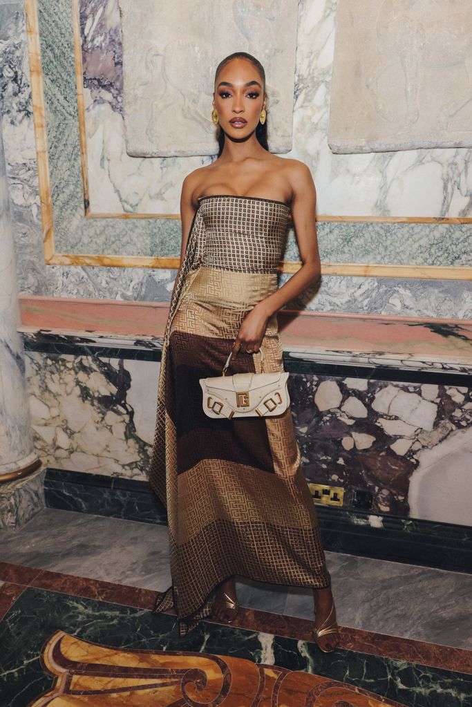 Jourdan Dunn wearing a strapless dress at a dinner hosted by Olivier Rousteing 