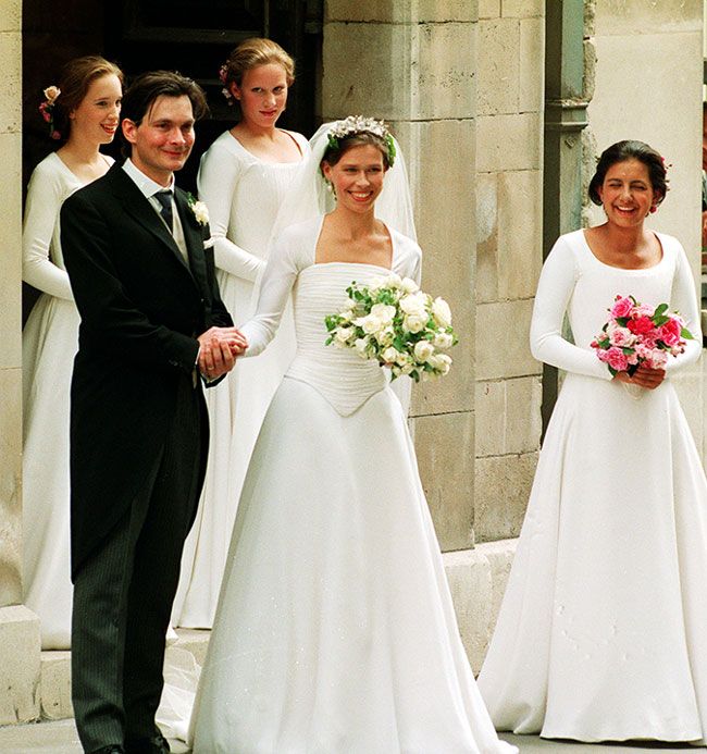 sarah chatto and daniel holding hands following their wedding