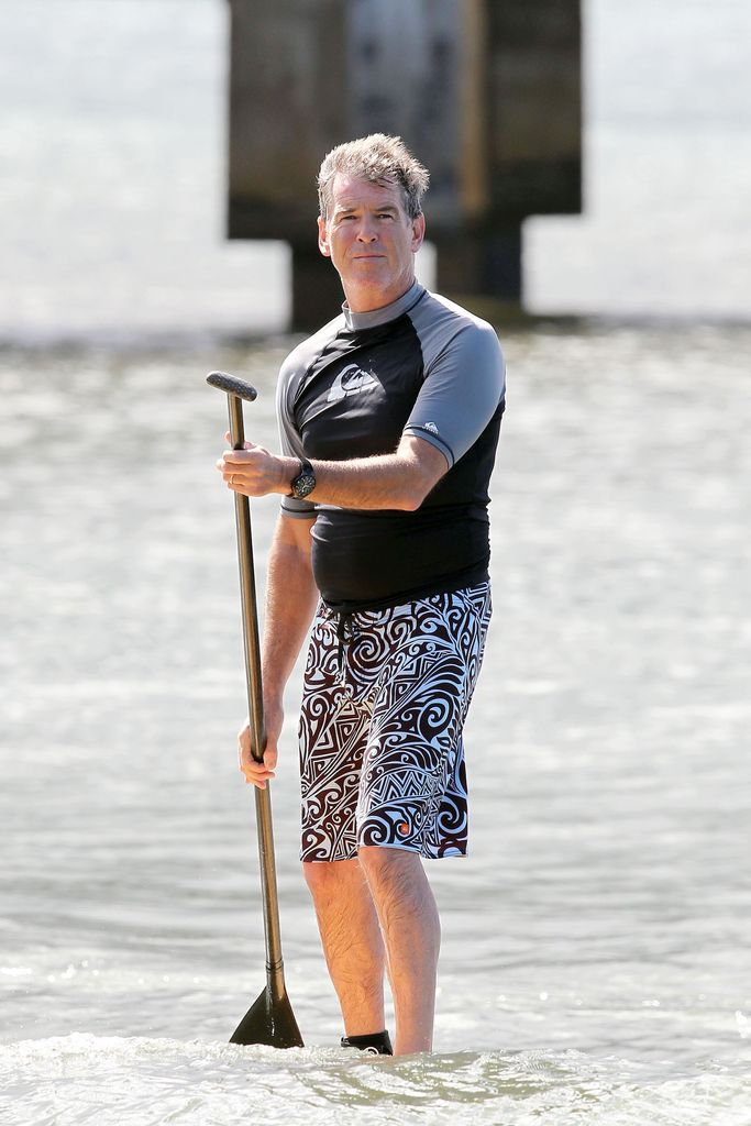 Pierce Brosnan paddle boarding in 2011