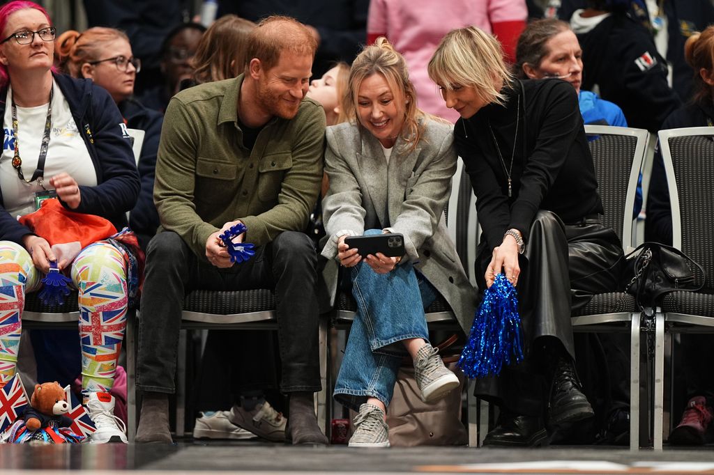 The Duke of Sussex sits alongside Ksenia Ilenkiv (centre) and Olga Rudneva (right) at the 2025 Invictus Games in Vancouver, Canada.