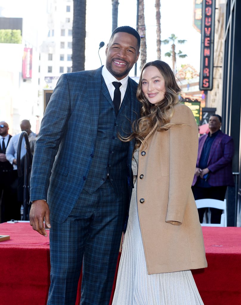 Michael Strahan, Kayla Quick at the star ceremony where Michael Strahan is honored with the first Sports Entertainment star on the Hollywood Walk of Fame on January 23, 2023 in Los Angeles, California. (Photo by Gilbert Flores/Variety via Getty Images)
