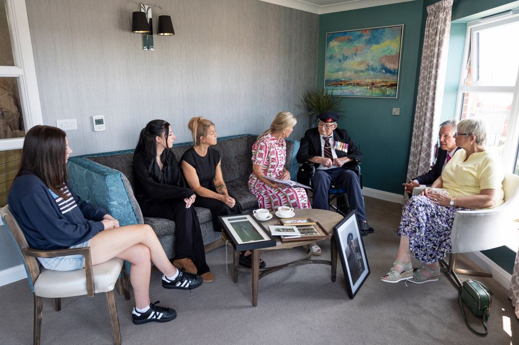Great granddaughter Ellie Dables, great granddaughter Freya Dables, granddaughter Kirsty Dables, Sophie, the Duchess of Edinburgh, patron of the Java Far East Prisoner of War Club 1942, 105-year-old Royal Marines veteran James 'Jim' Wren, son-in-law Andy Dables and daughter Denise Dables sit together