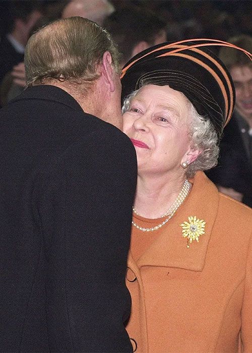 The Queen and Prince Philip kiss