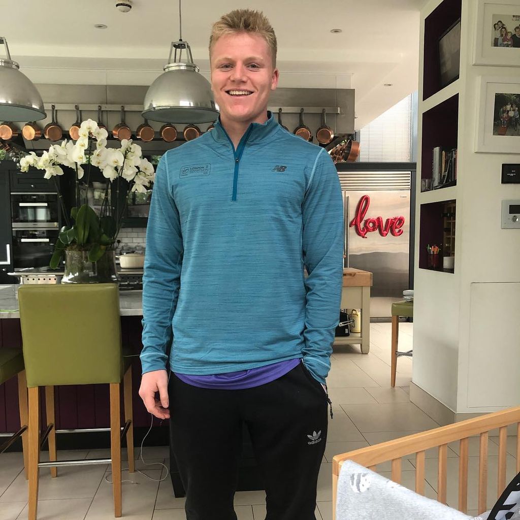 gordon ramsay son standing in family kitchen