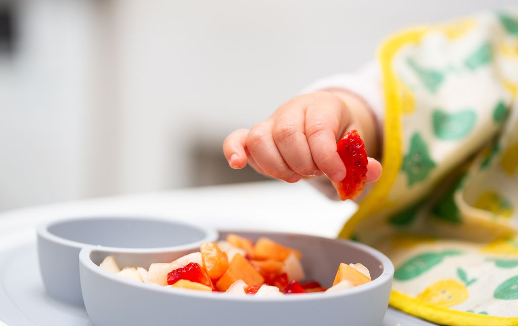 Chopped up fruit is a good addition to a child's breakfast