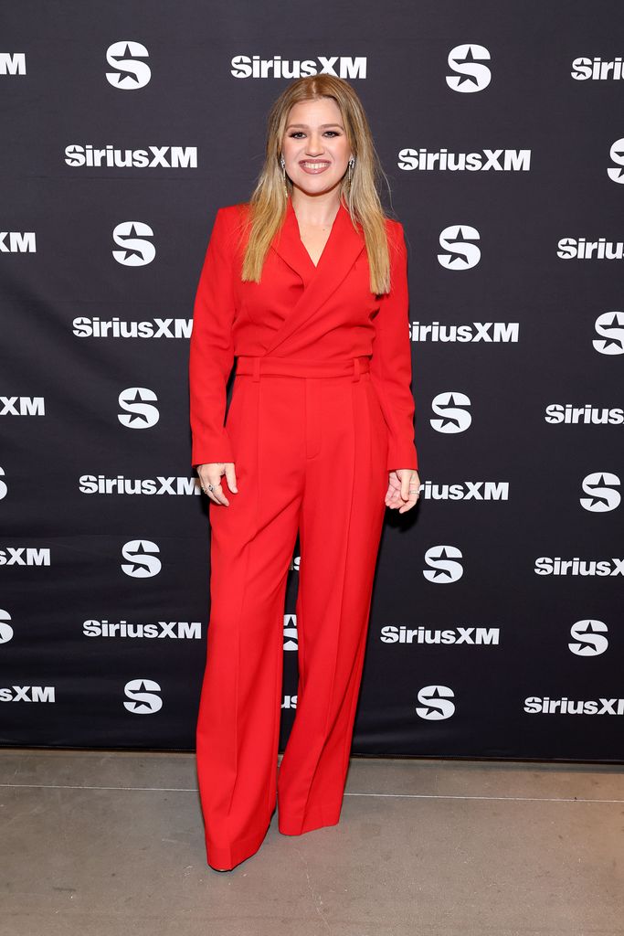 Kelly Clarkson in red suit