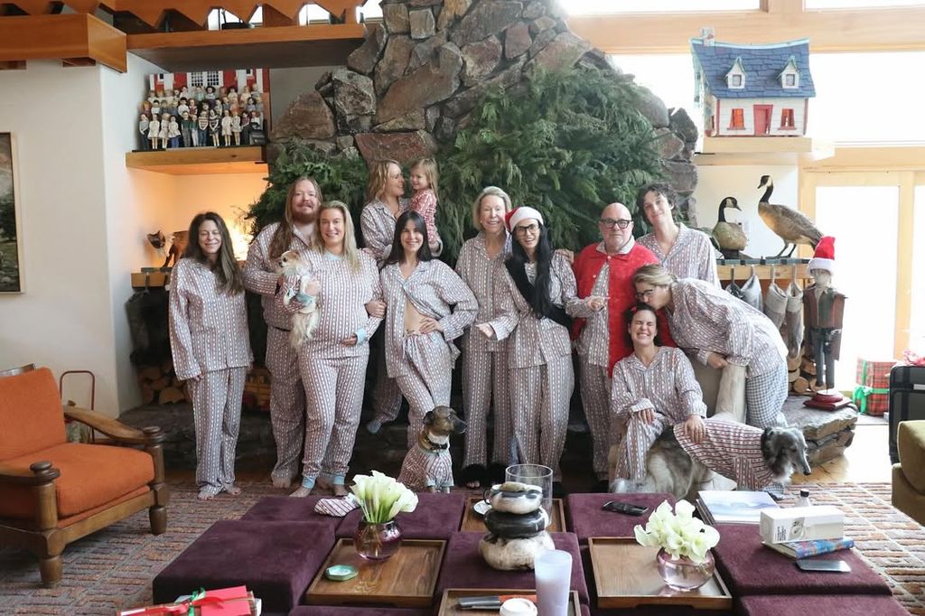 Demi Moore in gray chequered pjs with family