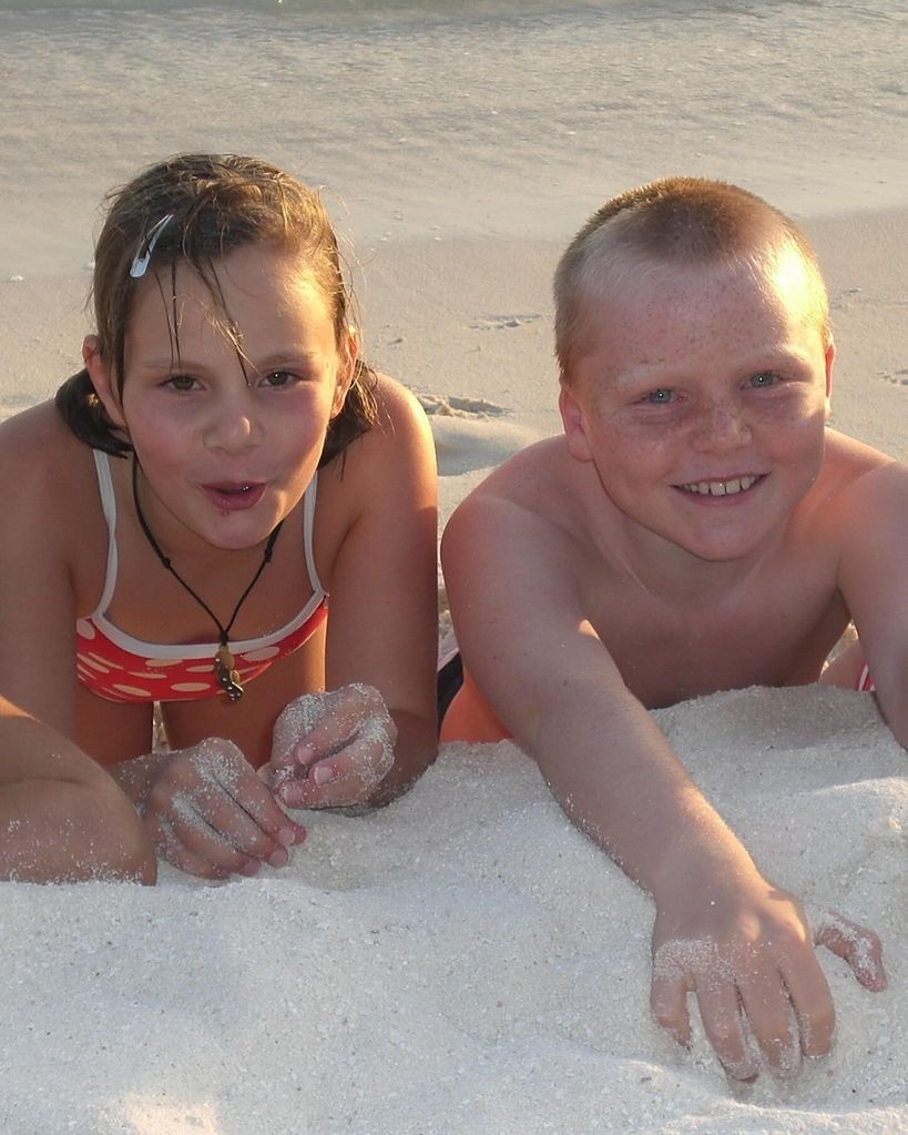 The twins as children on beach