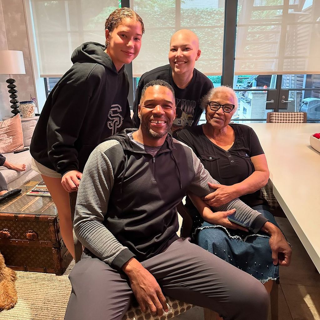 Michael Strahan with his twin daughters Isabella and Sophia and his mom Louise 