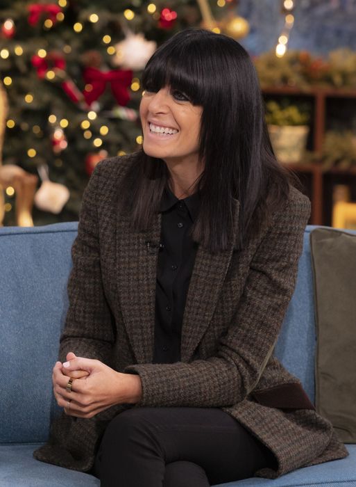 claudia winkleman in dark clothes on this morning sofa