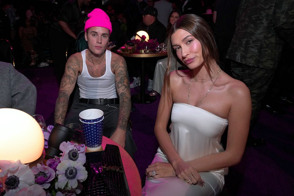 LAS VEGAS, NEVADA - APRIL 03: (L-R) Justin Bieber and Hailey Bieber attend the 64th Annual GRAMMY Awards at MGM Grand Garden Arena on April 03, 2022 in Las Vegas, Nevada. (Photo by Kevin Mazur/Getty Images for The Recording Academy)