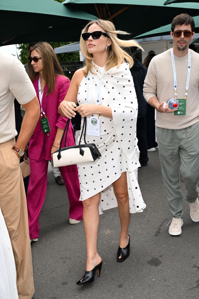 Margot Robbie attends day twelve of the Wimbledon Tennis Championships at the All England Lawn Tennis and Croquet Club on July 12, 2024 in London, England