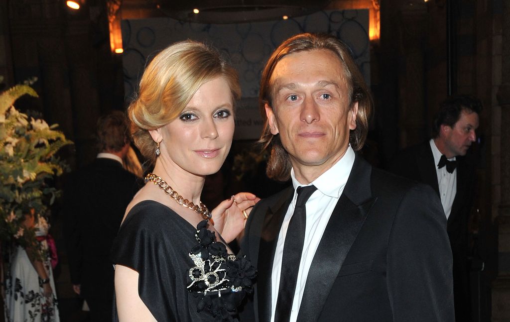 Emilia Fox and Jeremy Gilley pose together at a black tie event