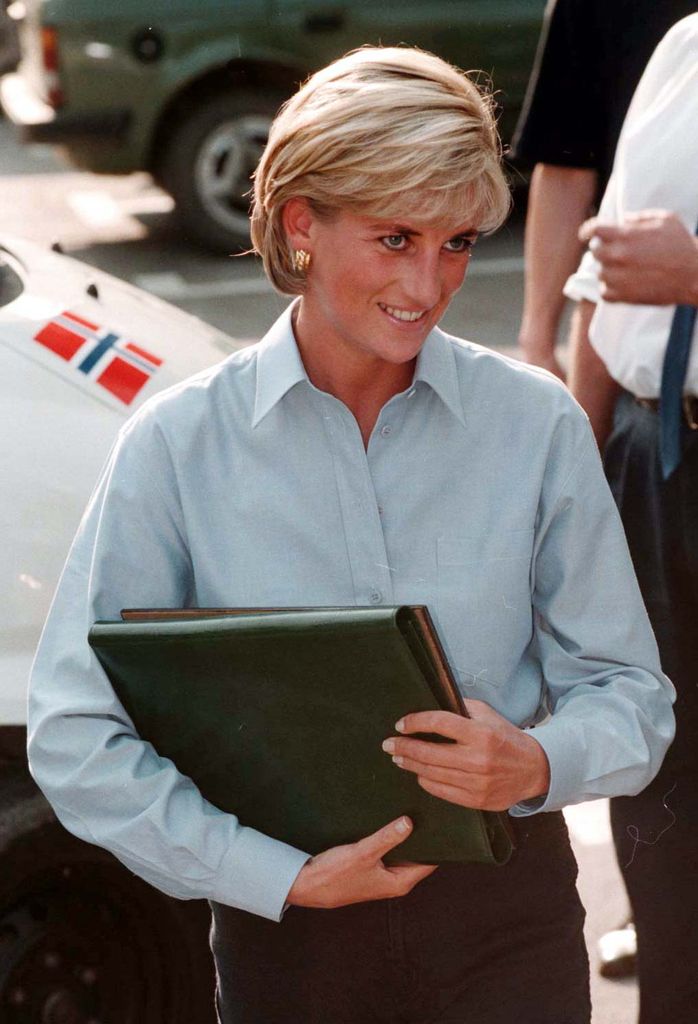 Princess Diana wearing a blue shirt