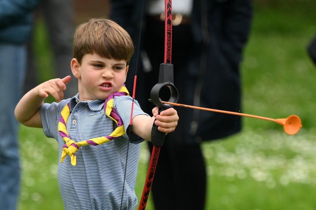 Prince Louis taking part in archery