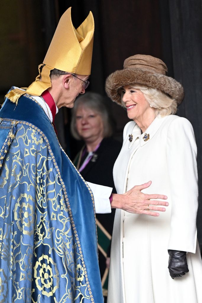 bishop greeting queen camilla at cathedral 