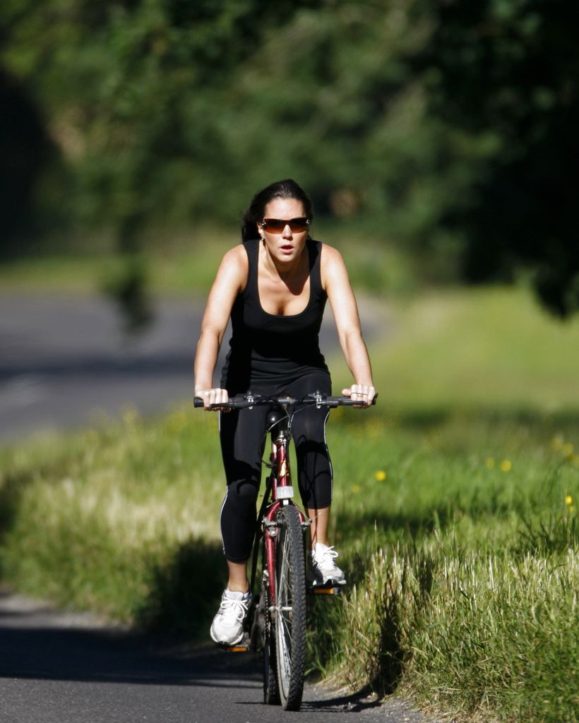 Kate Middleton riding her bike on her way to work at her parents mail order company 'Party Pieces', Reading, Berkshire
