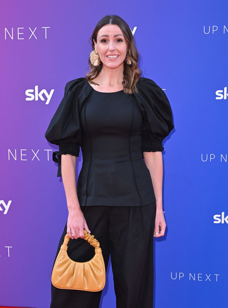 Suranne Jones in a black dress