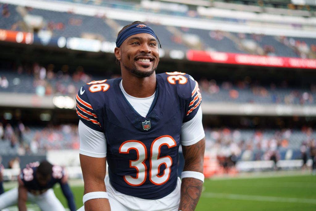 Jonathan Owens No. 36 of the Chicago Bears smiles during warmups before an NFL preseason game against the Cincinnati Bengals at Soldier Field on August 17, 2024 in Chicago, Illinois.