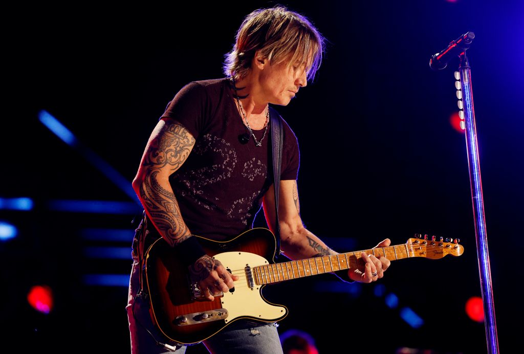 Keith Urban performs onstage during the 2024 CMA Music festival at the Nissan Stadium on June 08