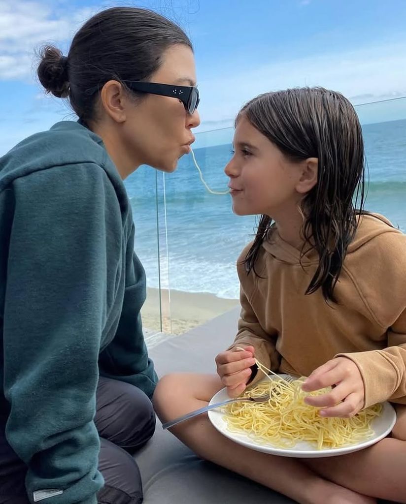 Kourtney Kardashian and daughter Penelope eat spaghetti together