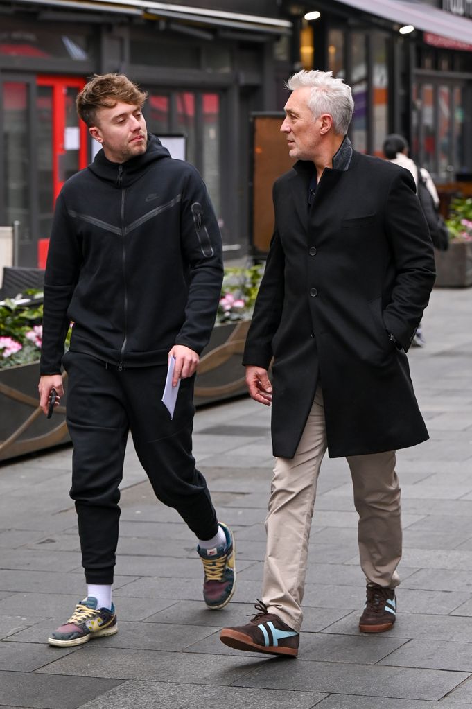 Roman Kemp and Martin Kemp walking outside Global Radio studios 
