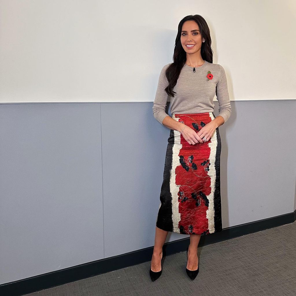 Christine Lampard in black, white and red skirt