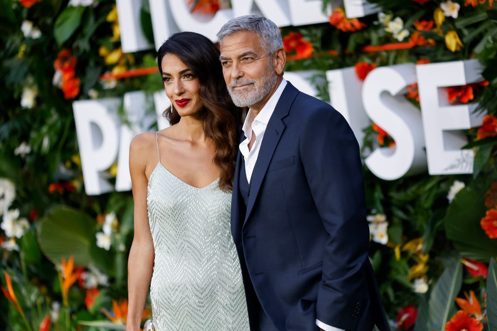 Amal Clooney and George Clooney attend the World Premiere of "Ticket to Paradise" at Odeon Luxe Leicester Square on September 07, 2022 in London