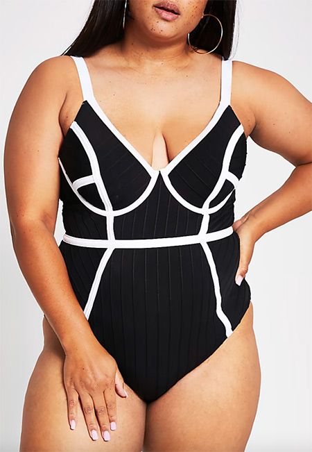 This Chanel bathing suit in classic black and white is absolutely