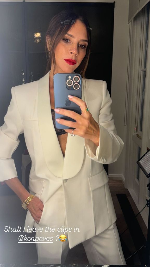 victoria beckham wearing cream suit 