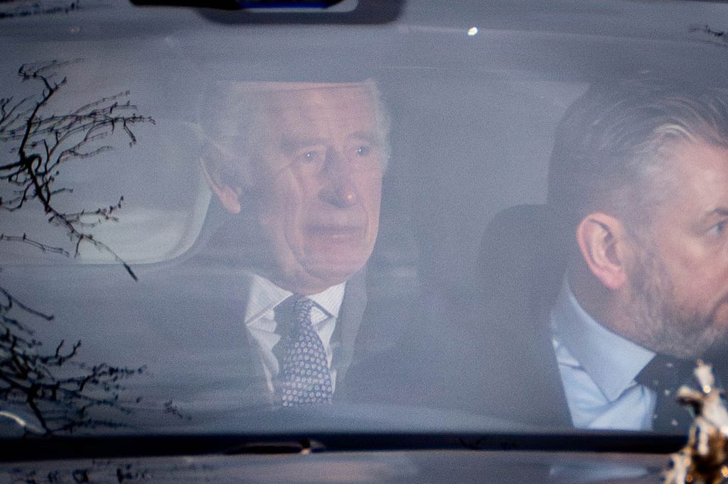 King Charles appeared emotional as the crowds cheered for him and Camilla as they entered Buckingham Palace