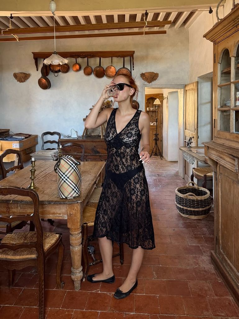 Marie Gaguech in lace dress