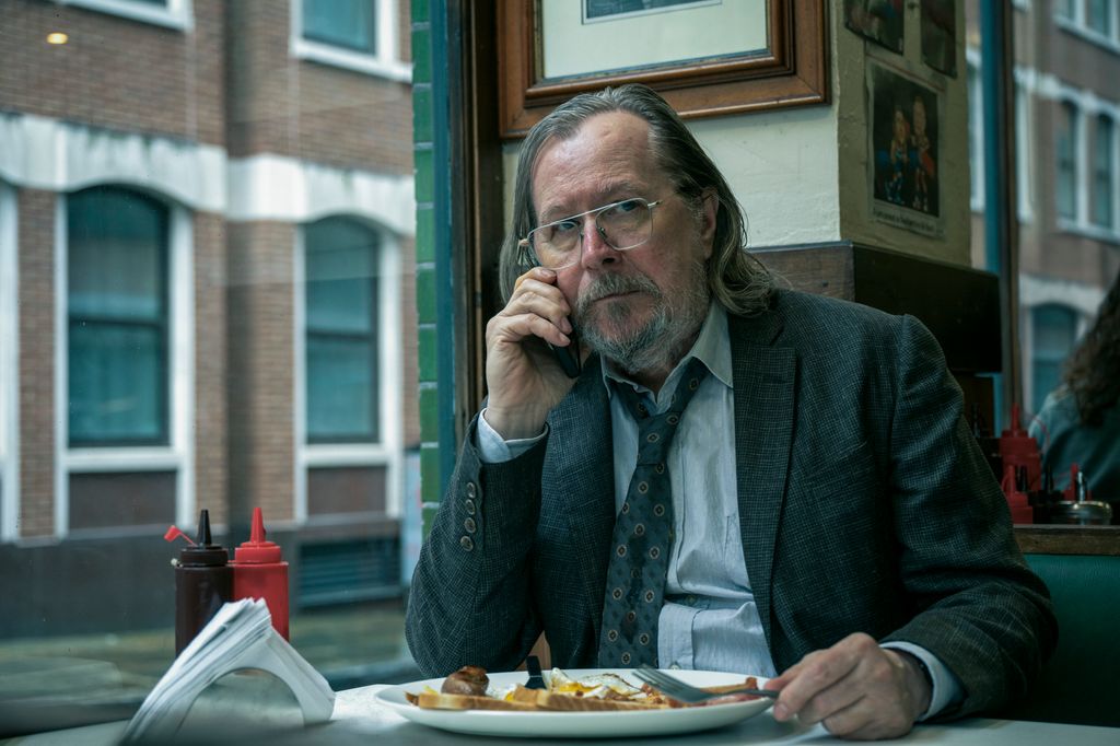 man on phone in cafe