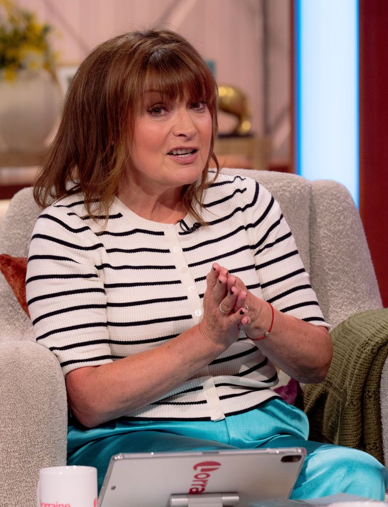 Lorraine Kelly in a striped top on her show