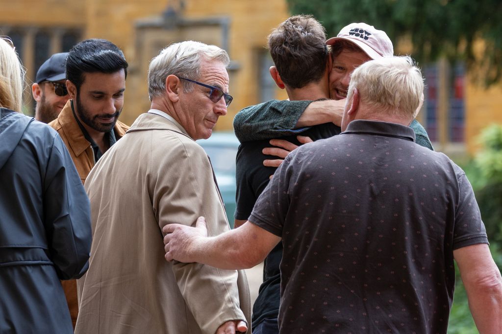 James was seen hugging Al Weaver on the set 