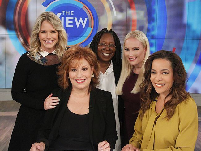 Stars of The View smile at camera