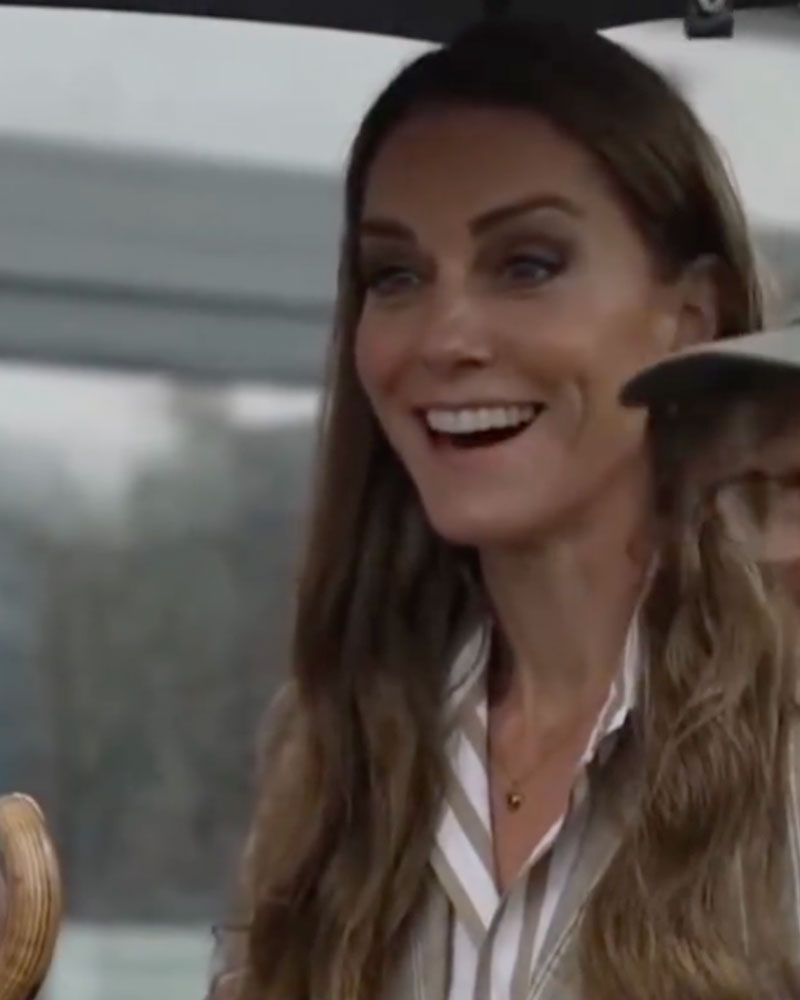 Princess Kate was all smiles under the British rain