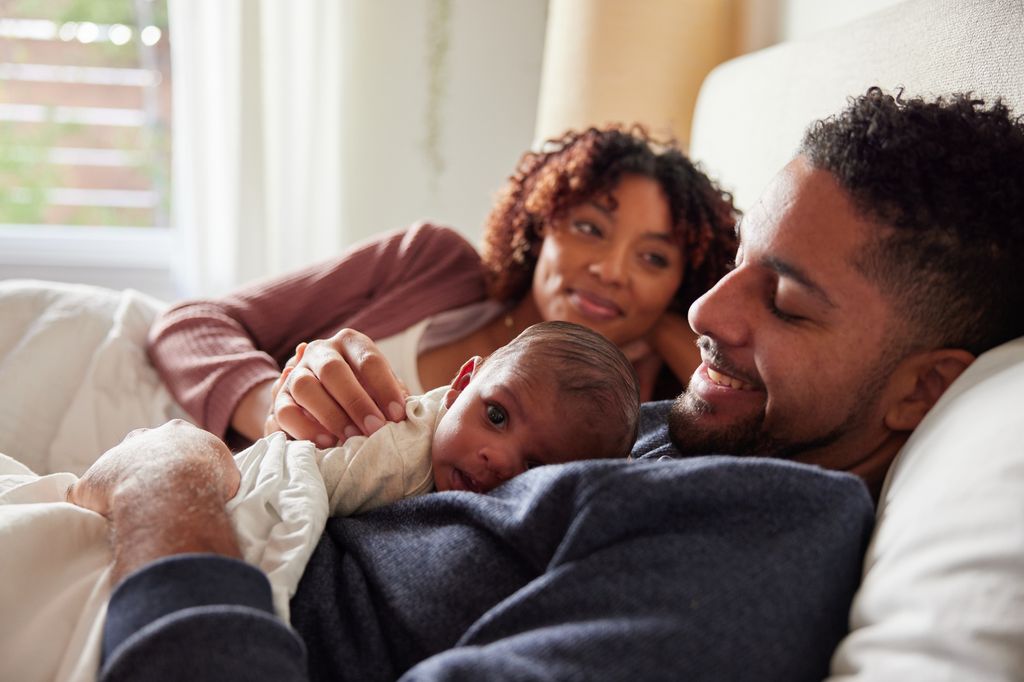 couple with baby happy mother.