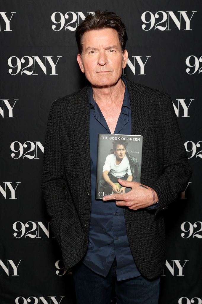 Charlie Sheen in black blazer at a conversation for his new book "The Book Of Sheen" with David Duchovny at 92NY 