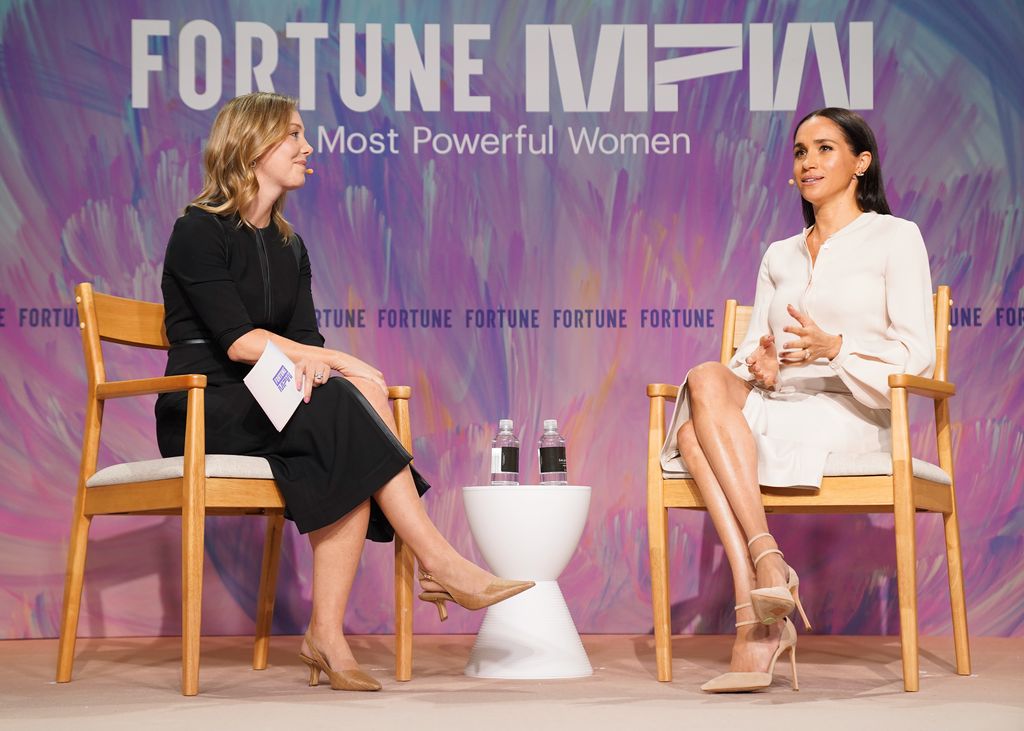 Alyson Shontell and Meghan Markle on stage talking