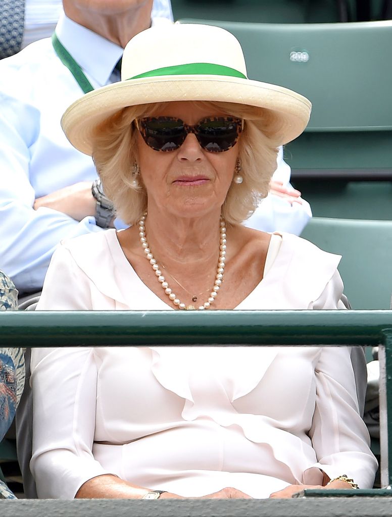 Queen Camilla wearing hat and sunglasses at Wimbledon 2015