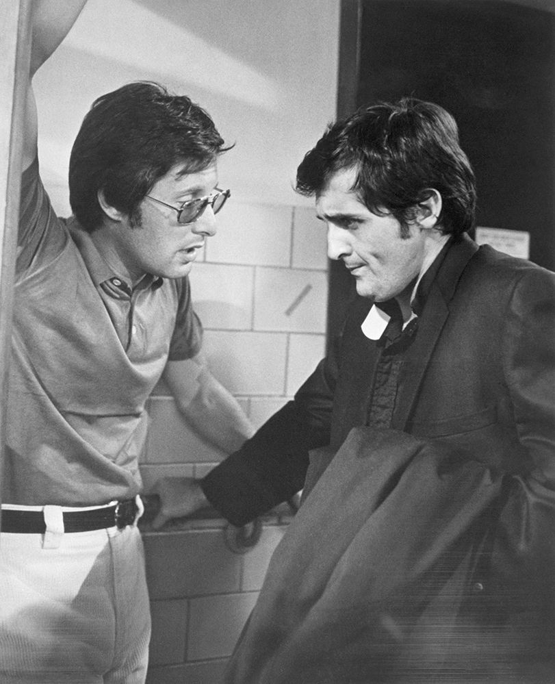 Director William Friedkin and actor Jason Miller on the set of The Exorcist 