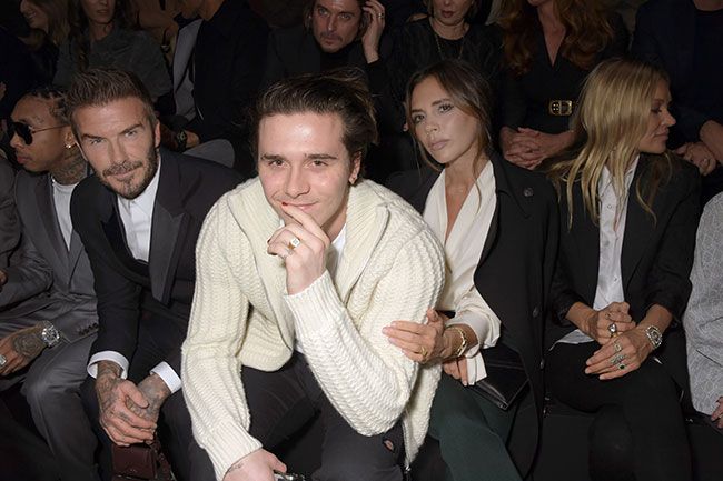 brooklyn beckham with his parents