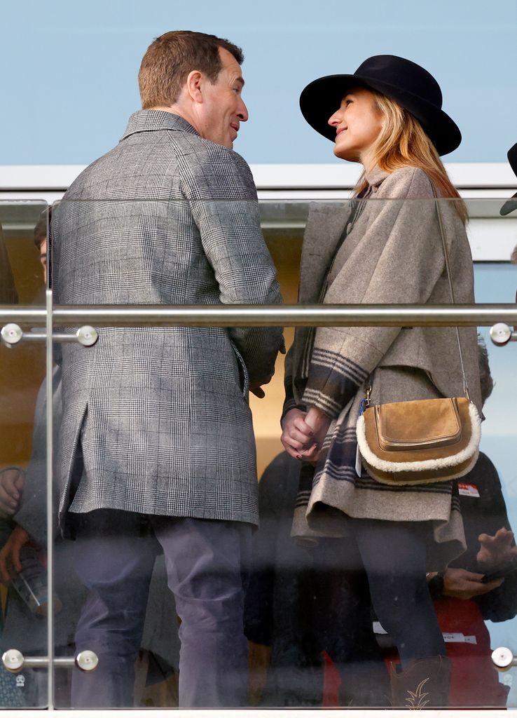 Peter Phillips and Harriet Sperling attend the New Year's Day Racing Meet at Cheltenham Racecourse