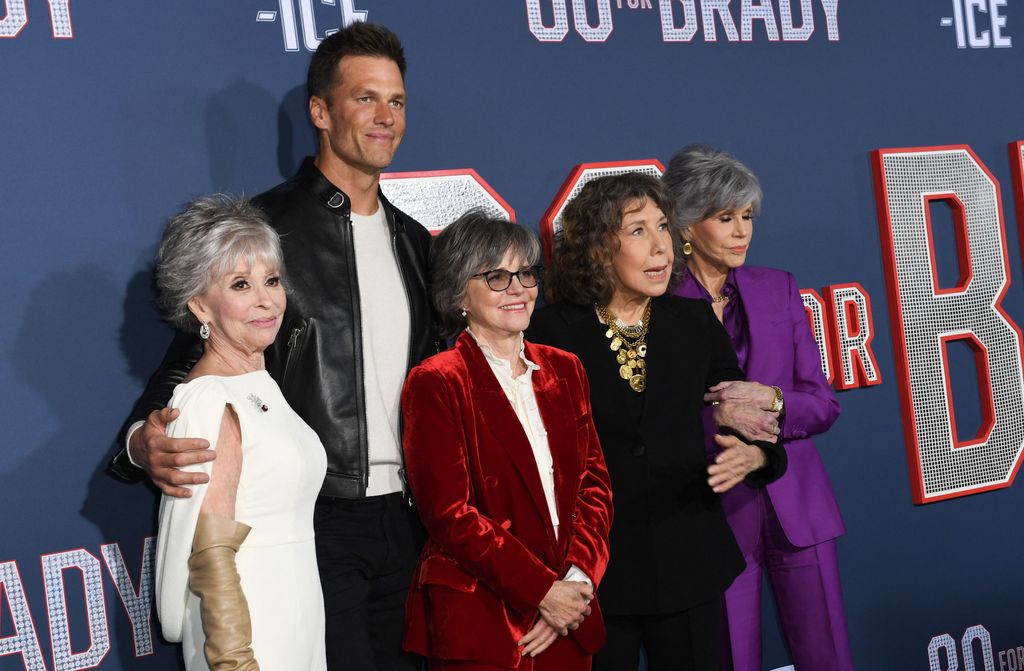 (L-R) Rita Moreno, Tom Brady, Sally Field, Lily Tomlin and Jane Fonda arrive for the Los Angeles premiere screening of "80 For Brady" at the Regency Village Theatre in Los Angeles, California, on January 31, 2023. (Photo by VALERIE MACON / AFP) (Photo by VALERIE MACON/AFP via Getty Images)