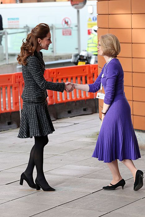kate middleton greeted by woman